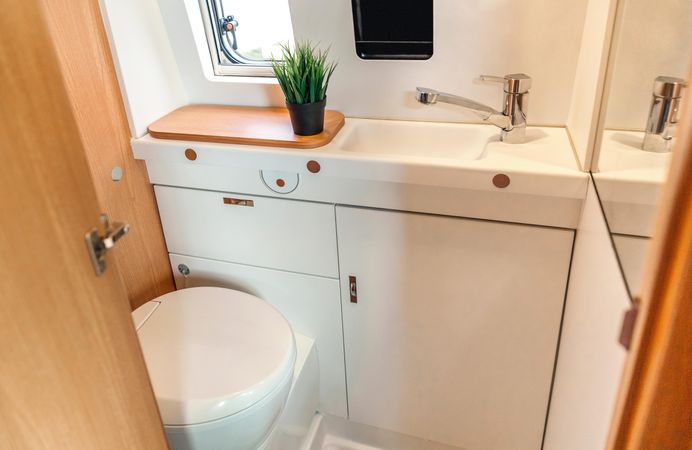 Motorhome toilet with plant