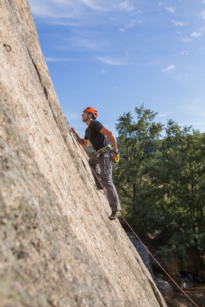Man climbing a rock