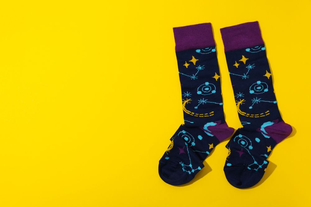 Concept of clothes for legs - socks, space for text