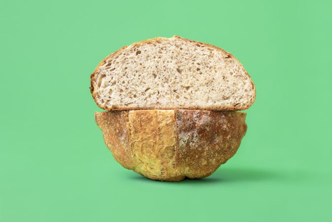 Sliced bread on a green background