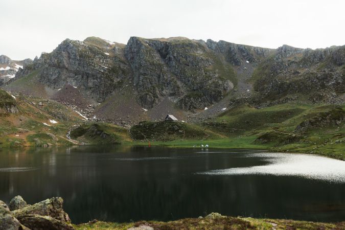 Picturesque view of small house in mountains