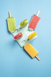 Overhead of homemade fruit popsicles