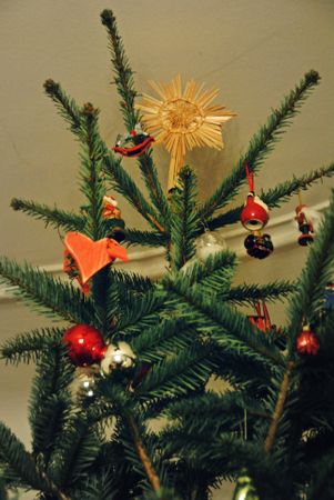 Decorated Christmas tree with ornaments indoor