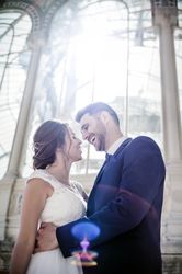 Newly weds having fun near vintage building