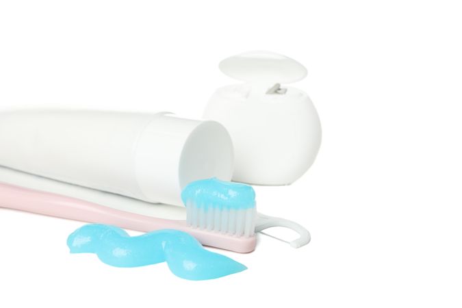 Dental care kit isolated on light background