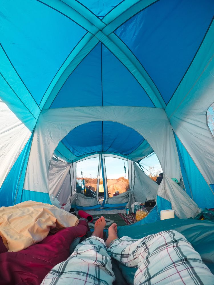 Interior shot of tent with people