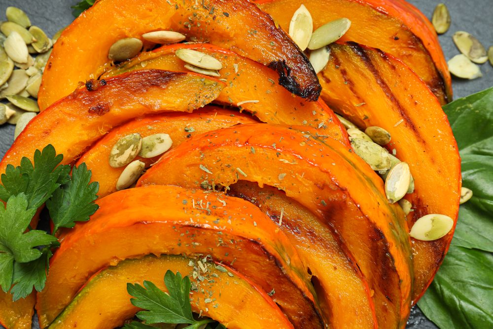 Concept of tasty homemade dish - baked pumpkin