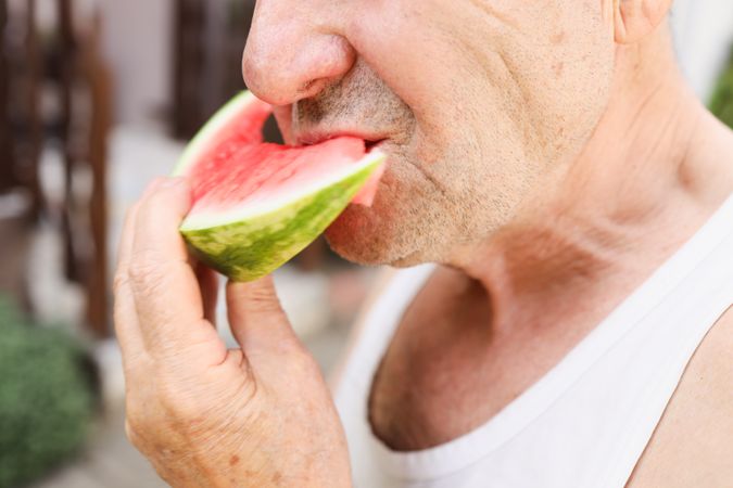 Detail of a Fresh Watermelon Snack for an Older Man.