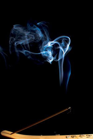 Swirls of bright blue fume