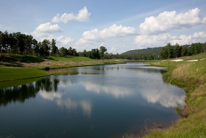 Still pond on golf course on sunny day in Alabama
