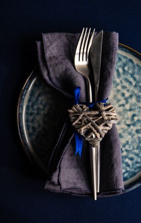 Valentine day blue table setting with heart decoration