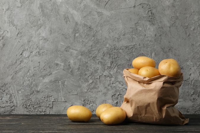 Kitchen counter with bag of potatoes