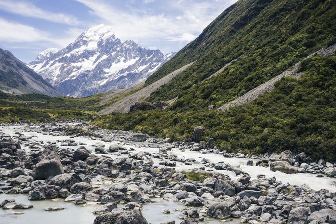 Mountain rocky river and cliffs at New Zealand