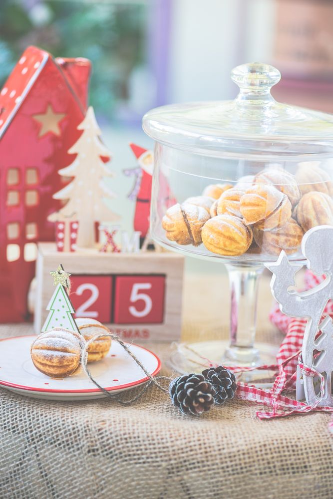 Holiday dessert cookies stuffed with caramel cream surrounded by decorations