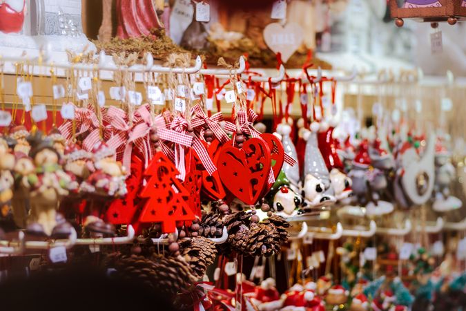 Red Christmas ornaments on sale in market in Strasbourg, Alsace, France
