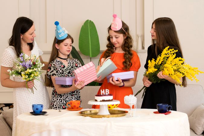 Family and friends exchanging gifts