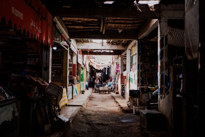 Marketplace in dark grungy passage