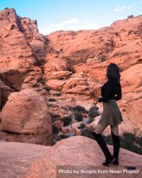 Woman standing in Red Canyon National Conservation Area in Nevada, USA 5z6lA5