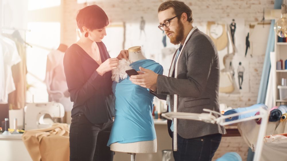 Male and Female fashion, designers are Working on Tailored Mannequin Wearing Clothes.