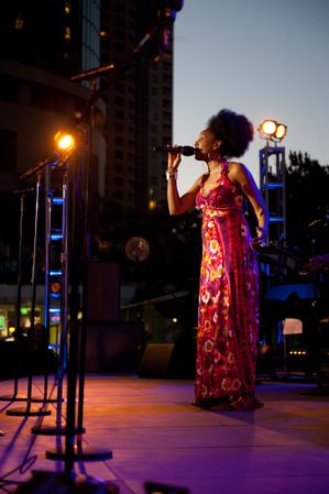 Los Angeles, CA, USA - July 12, 2012: Nailah Porter singing with microphone onstage