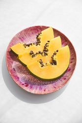 Sliced ripe papaya on plate