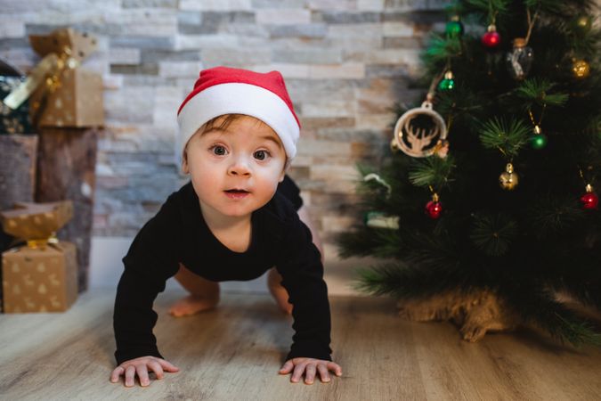Excited baby with Christmas gift