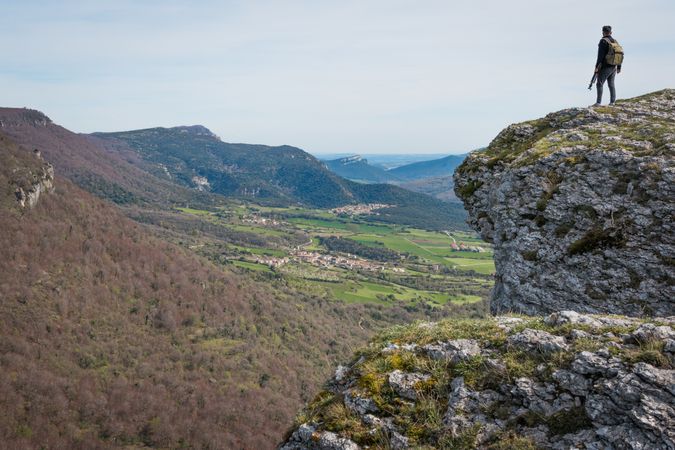 Tourist standing on high mountain