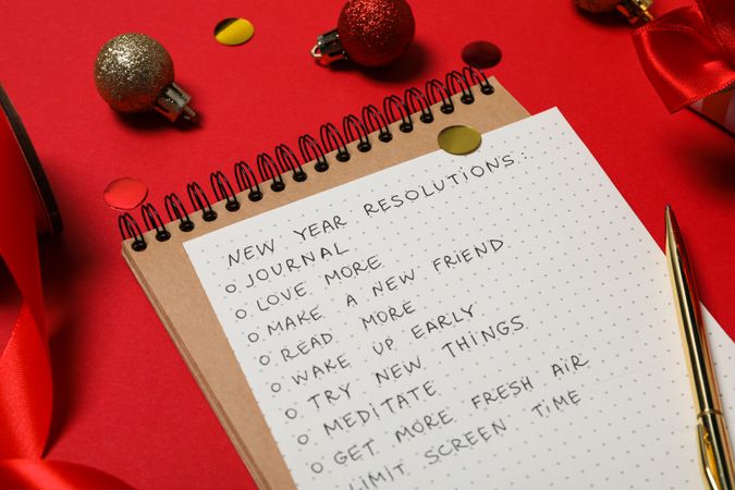 Concept of New Year Resolutions list, new year goals, close up