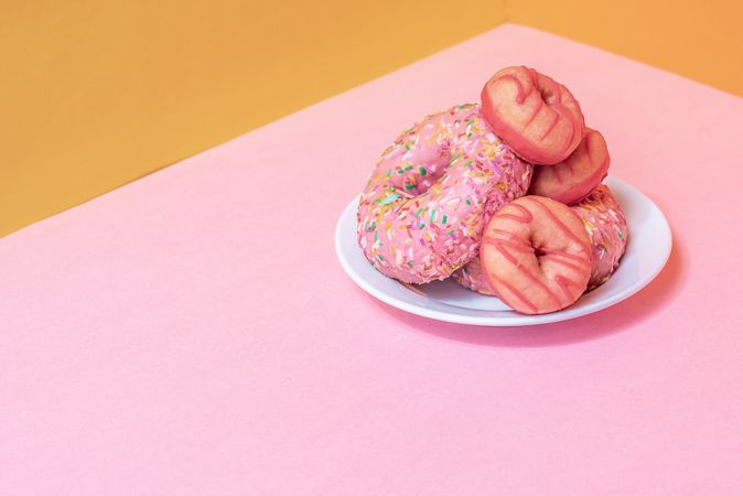 Pink doughnuts in a colorful background