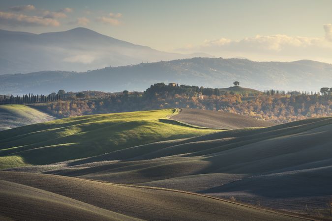 Countryside landscape, rolling hills and Mount Amiata, Asciano, Tuscany, Italy