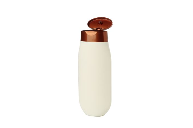Blank plastic shampoo or lotion bottle isolated on light background