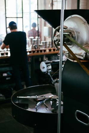Coffee roasting machine at coffee facility