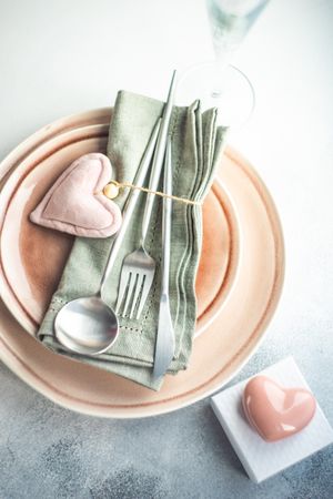 Pink table setting for Valentine's day with pink ornaments