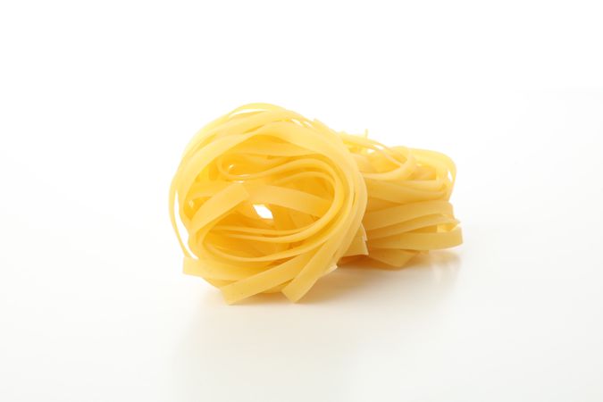 Tasty pasta isolated on plain background. Spaghetti food