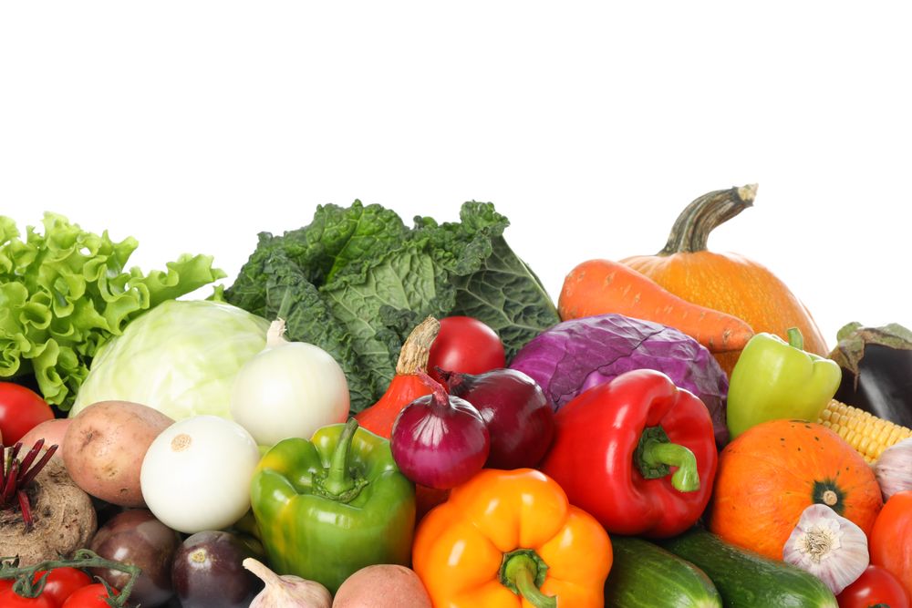 Composition with fresh vegetables isolated on plain background