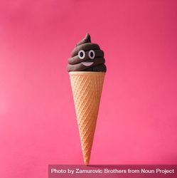 Poop emoticon in ice cream cone on pink background 4mvDvb