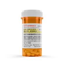Acetaminophen Prescription Medicine Bottle and Pills Isolated on a blank Background.