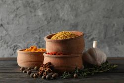 Wooden bowls stacks full of spices