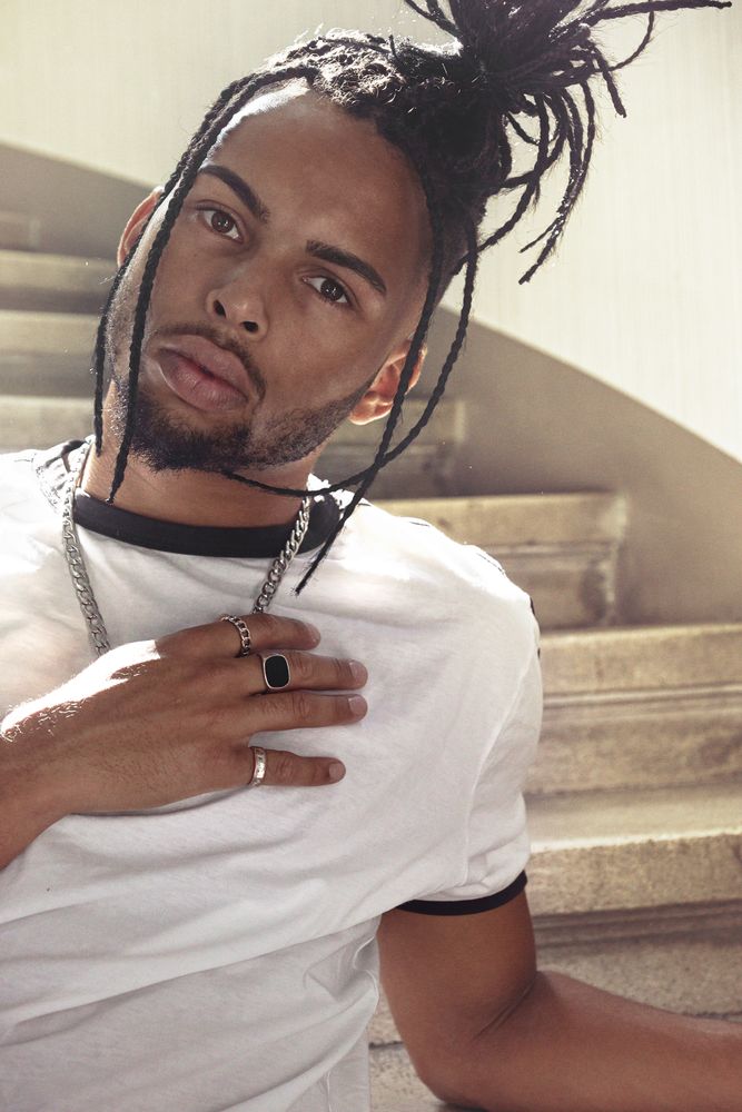 Black male with trendy hairstyle