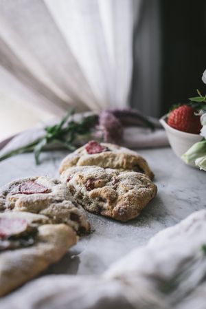 Strawberry scones on marble table