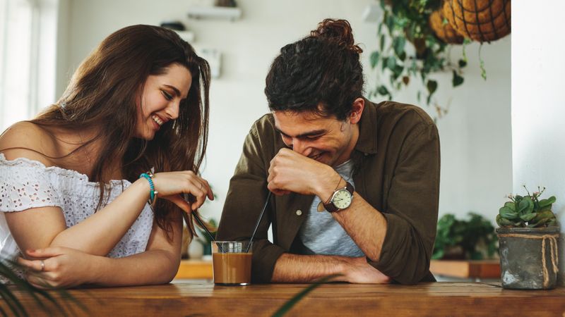 Young couple enjoying a coffee at a coffee shop