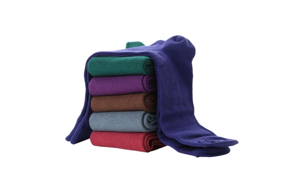 multicolored socks, isolated on light background.