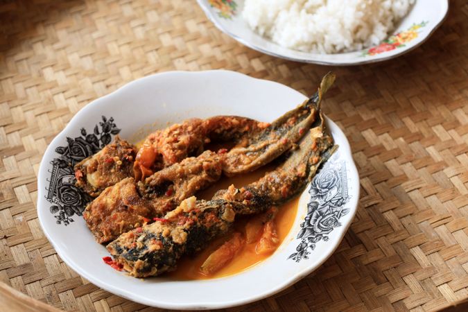 Lele Mangut , Smoked Catfish Cooked in Spicy Coconut Milk Curry Sauce.