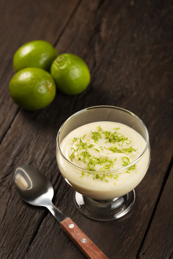 Lemon mousse with lemon zest on top.