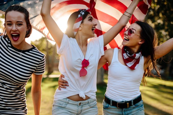 Smiling group of women celebrating 4th of july outdoors