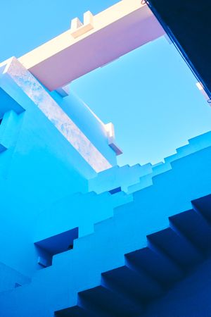 Blue building with straight interesting stairs