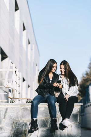 Females using mobile phone