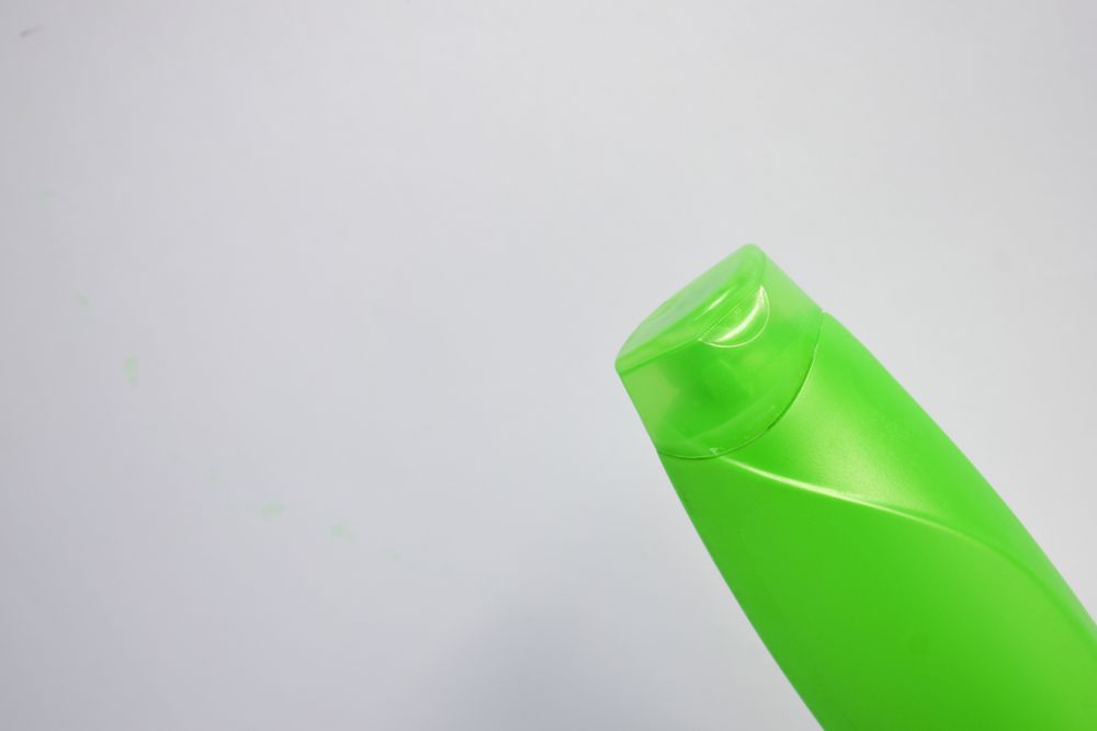 Green shampoo bottle without labels