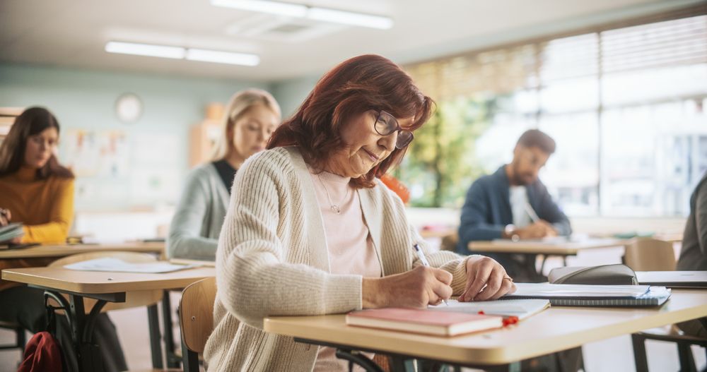 Portrait of a Happy Mature Woman Taking a Course in an International Adult Education Center.