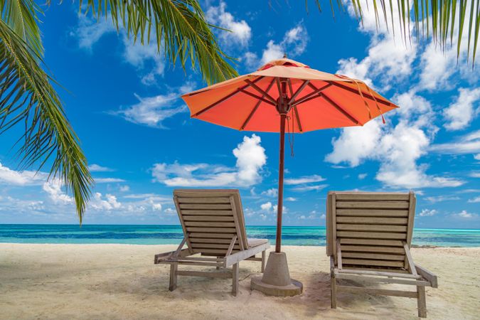 Beach lounge chairs on a tropical island, landscape